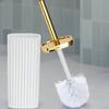 A white toilet brush set with a gold rotating handle and adjustable stand