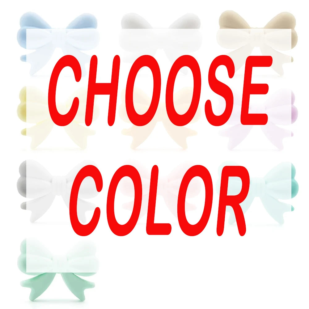 A collection of light colored fabric bows in various shades including blue, white, and pale pink.