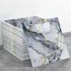 A stack of rectangular marble effect wall stickers featuring gray and black marble patterns with gold veining.