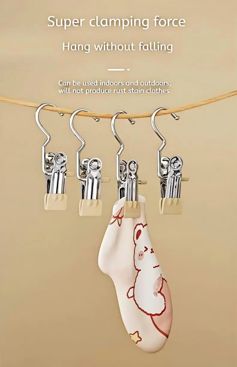 Stainless steel clothespins with hooks hanging laundry on a clothesline