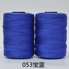 Two spools of blue 3-ply polyester knitting yarn for crochet and hand crafts