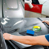 A hand applies a NeoWrap vinyl wrap to a car's interior panel using a professional tool kit.
