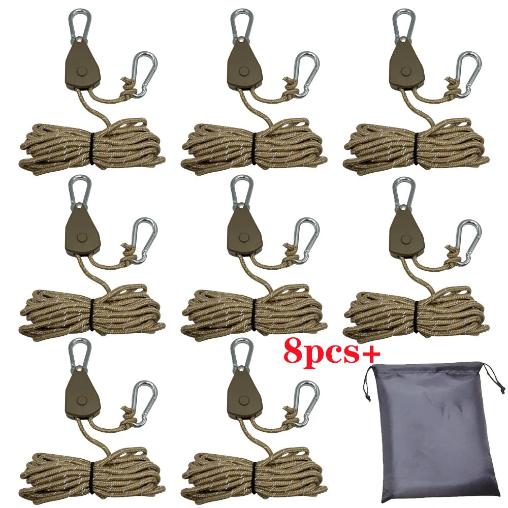 Eight camping rope tensioners with pulley buckles in brown and beige colors displayed on a gray fabric bag.
