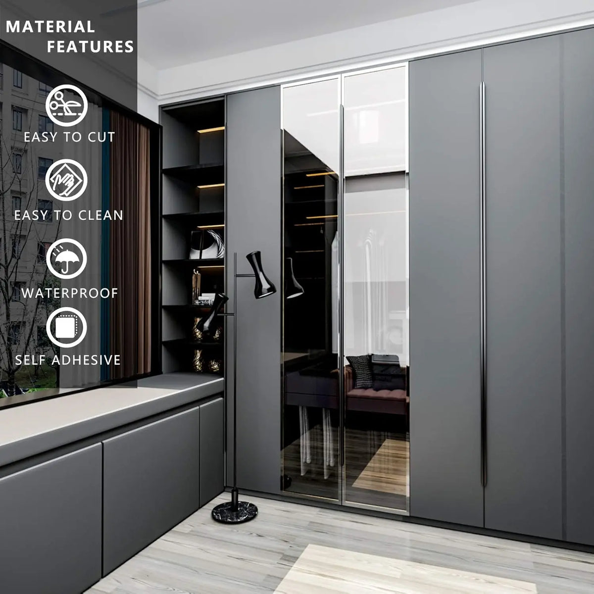 Matte black self-adhesive vinyl wallpaper applied to modern kitchen cabinets and countertops.