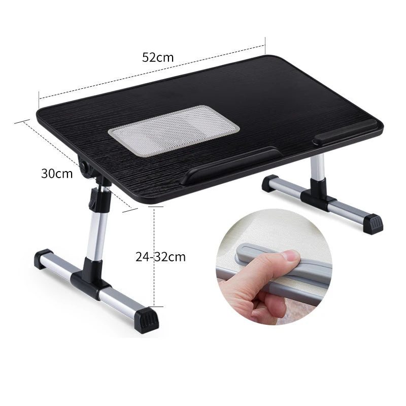 Black adjustable foldable laptop desk with a perforated surface and silver legs.