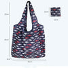 A dark blue and white patterned fabric shopping tote bag with a matching carry pouch.