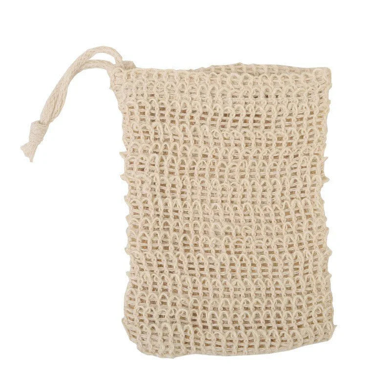 A natural beige sisal soap saver bag with an exfoliating mesh and a drawstring closure.