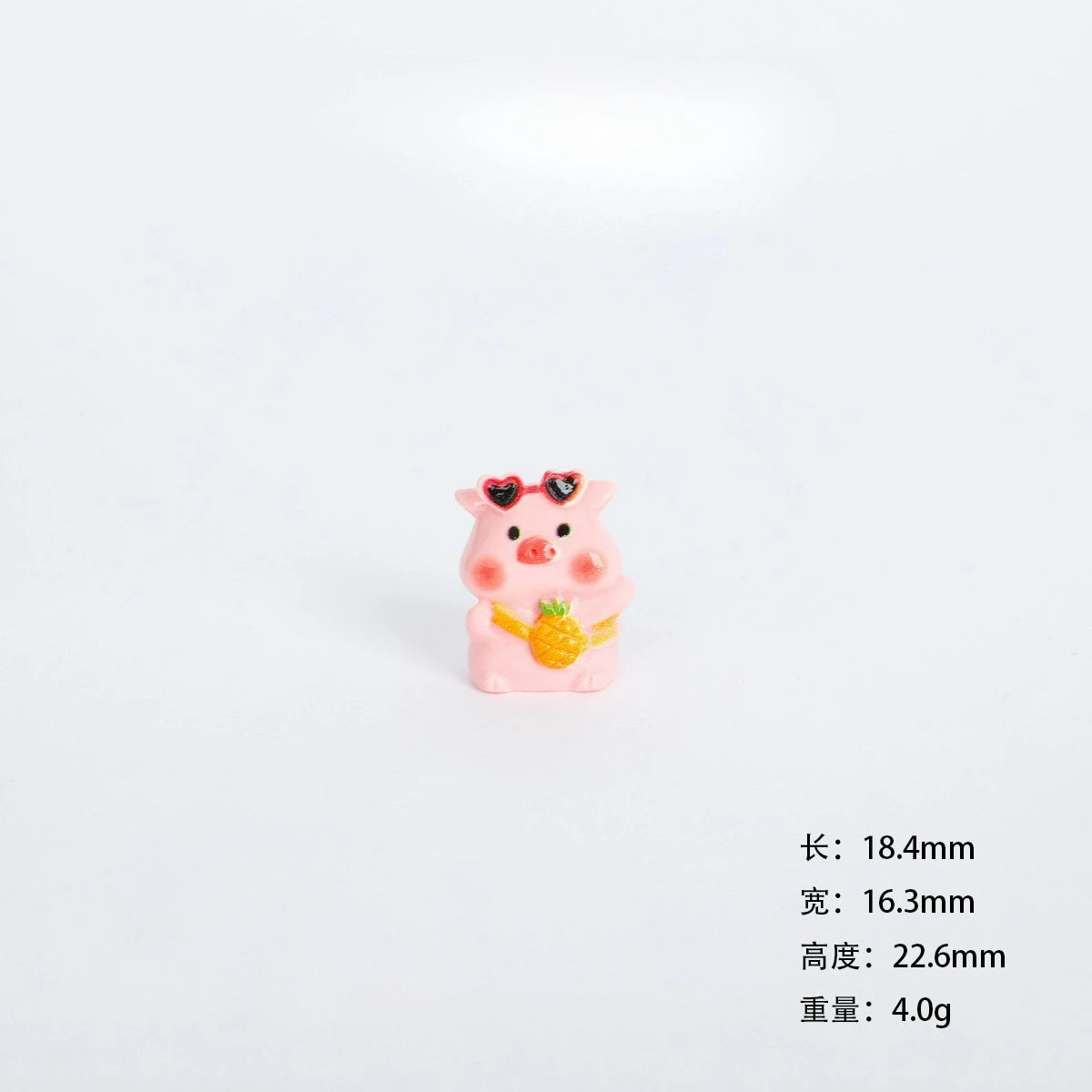 A small pink resin figurine of a pig wearing sunglasses, used as cute miniature garden and desk décor.