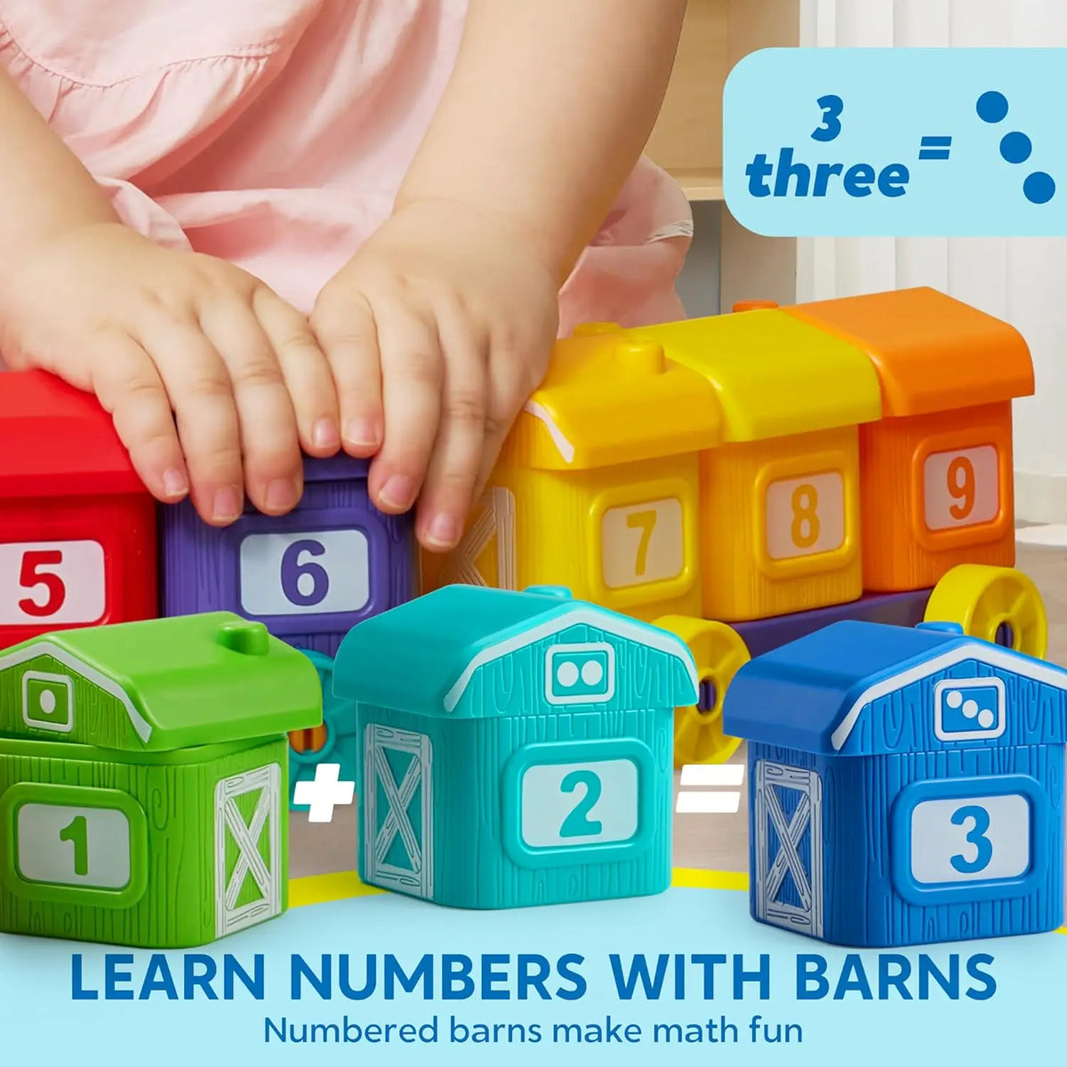 A child is interacting with wooden barns featuring numbers 1 through 9 to learn counting and matching skills.