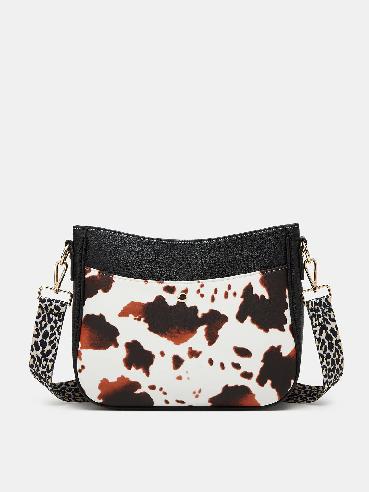 Black and white cow print leather crossbody shoulder bag with gold hardware