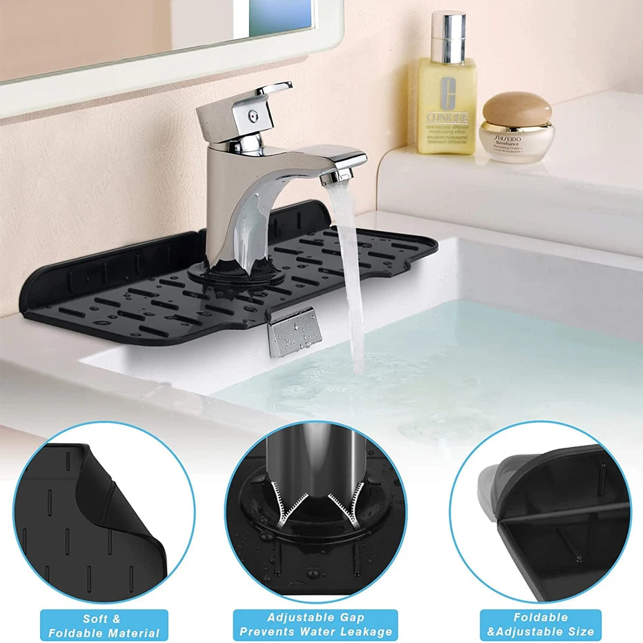 A black silicone faucet mat and sink splash guard with an adjustable faucet and water flow.