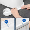 Hands are applying self-adhesive waterproof sealing tape to a window or sink gap, showing the tape's application angle.