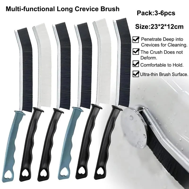 A pack of six multi-functional long crevice cleaning brushes with black and white bristles shown next to a sink.
