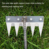 A close-up of a metal rake with wide tines and a wooden handle placed in green grass.