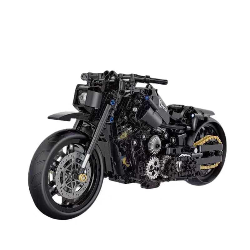 A detailed black motorcycle model kit featuring intricate mechanical parts and components.