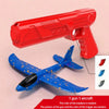 A red toy gun and a blue airplane are shown, with the color of the airplane random.