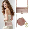 A woman models a pink crossbody phone wallet with card slots and zipper closure.