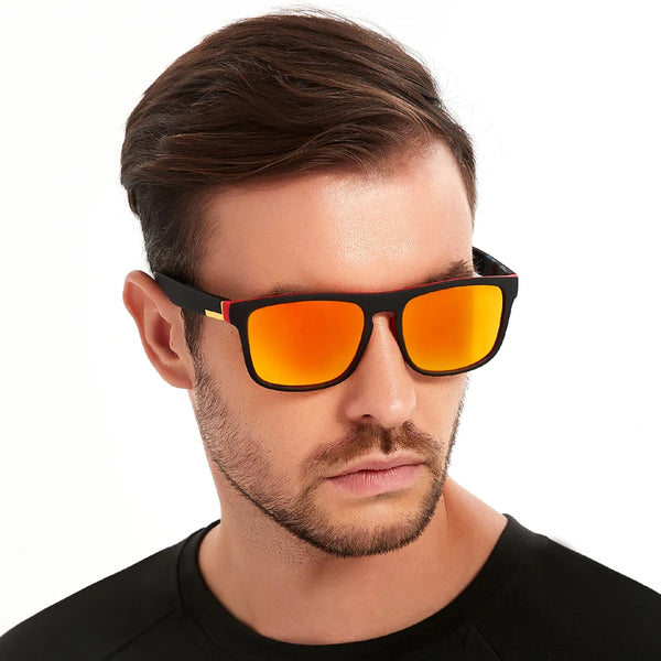 A man wearing orange-tinted vintage square sunglasses against a white background.