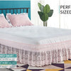 Pink ruffled lace bed skirt in a full size for a queen or king bed