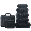 A stack of black rugged waterproof hard cases with customizable foam inserts.