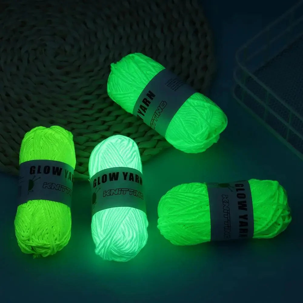 A bundle of neon green glow-in-the-dark polyester yarn for knitting and crochet is displayed on a dark surface.