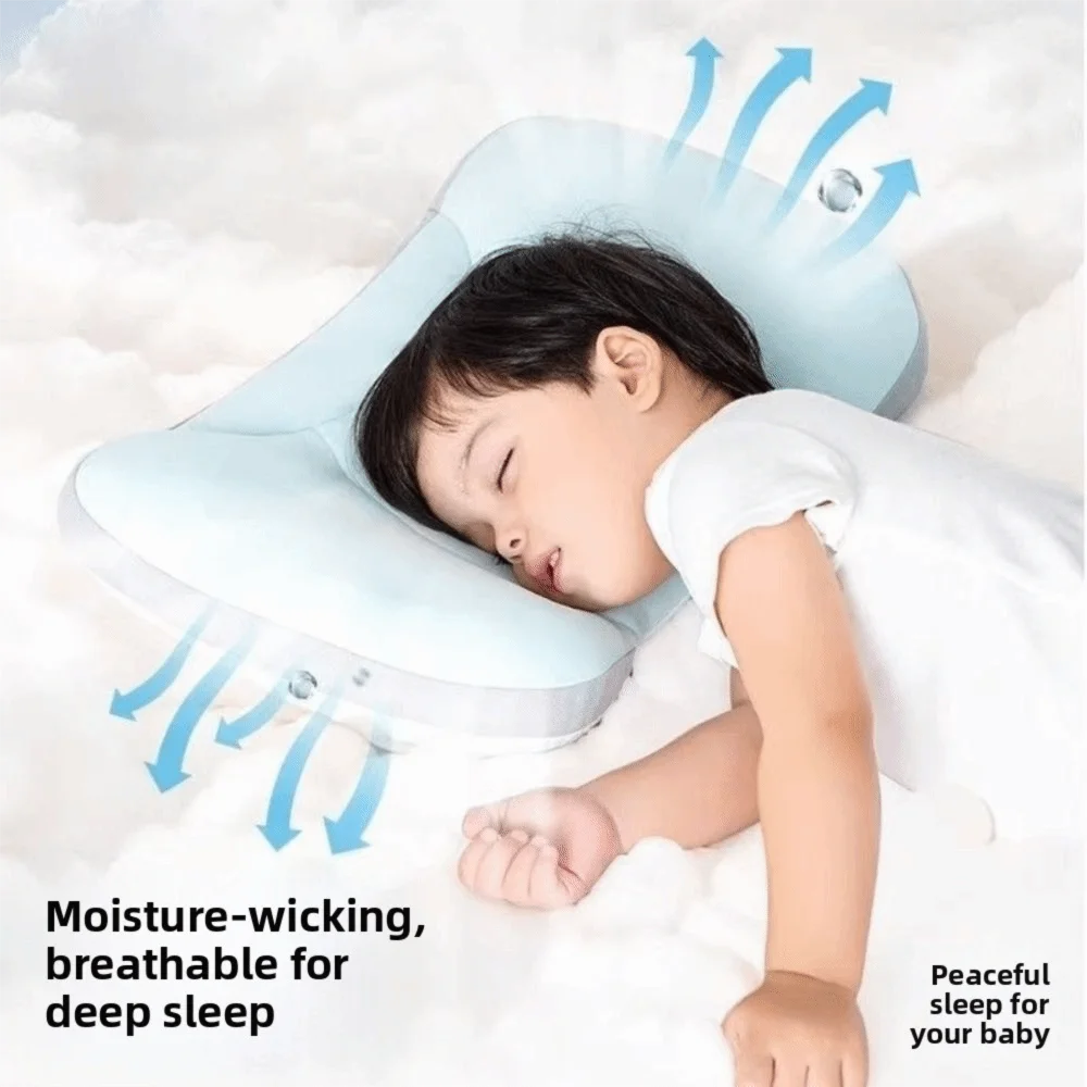 A baby is sleeping comfortably on a light blue moisture-wicking pillow for deep sleep.