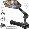 A black adjustable rearview mirror mounted on a handlebar, showing a street view.