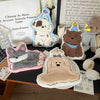 A collection of cartoon dog-themed hanging hand towels and accessories made of felt or fabric.