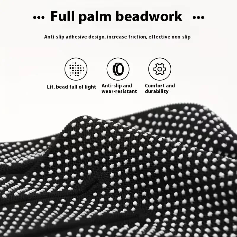 Close-up of black knitted anti-slip work gloves with a dotted grip pattern.
