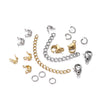 A collection of silver and gold jewelry components including lobster clasps, jump rings, and crimps.