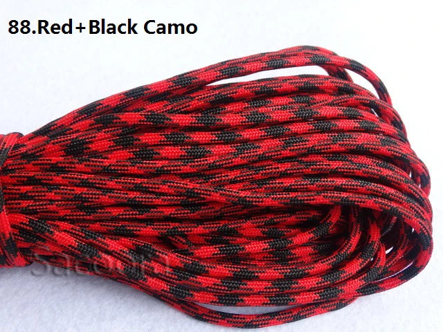 Red and black camo paracord rope coiled for camping and climbing