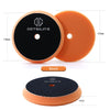 Two orange foam polishing pads for car detailing, one 5 inch and one 17mm.
