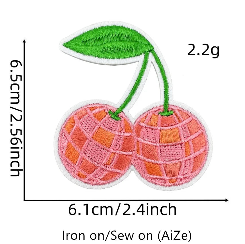 Two pink cherry embroidered patches measuring 6.5cm high and 6.1cm wide.