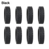A set of black silicone luggage wheel protectors designed to prevent scratching and reduce noise during travel.