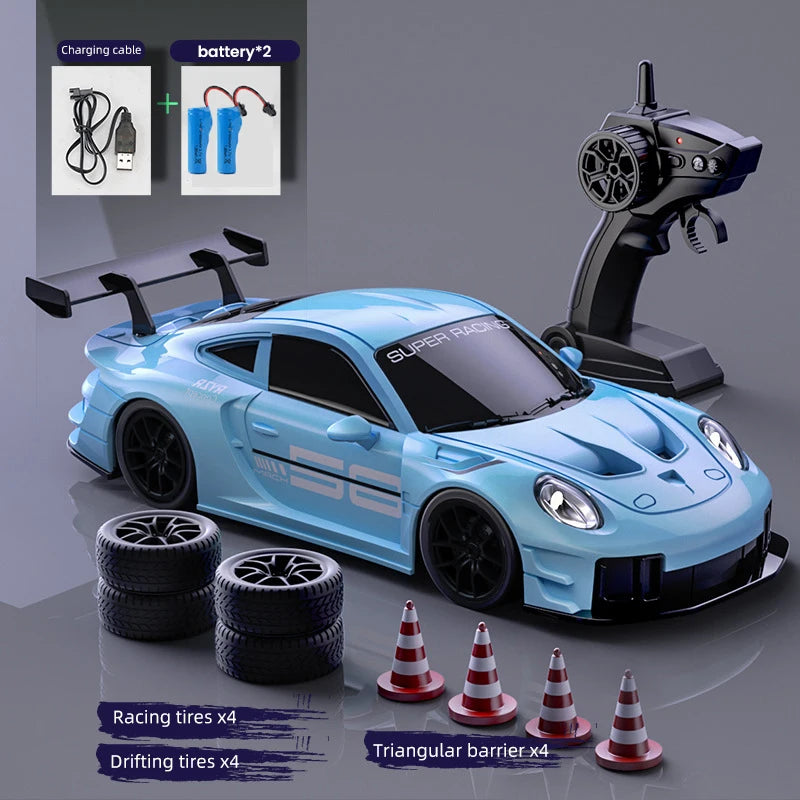 A blue Super Racing RC drift truck is shown with accessories including a charging cable and racing tires.