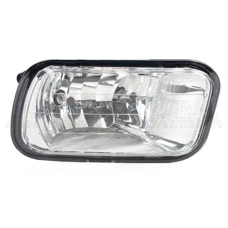 Clear headlight assembly for a Dodge Ram front bumper fog light.