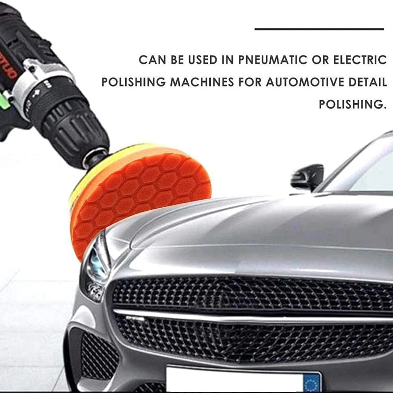 Orange polishing sponge pad set with hook-and-loop backing used for automotive detailing.