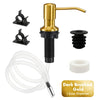 A gold-colored stainless steel liquid soap dispenser with an extension tube and separate pump components.