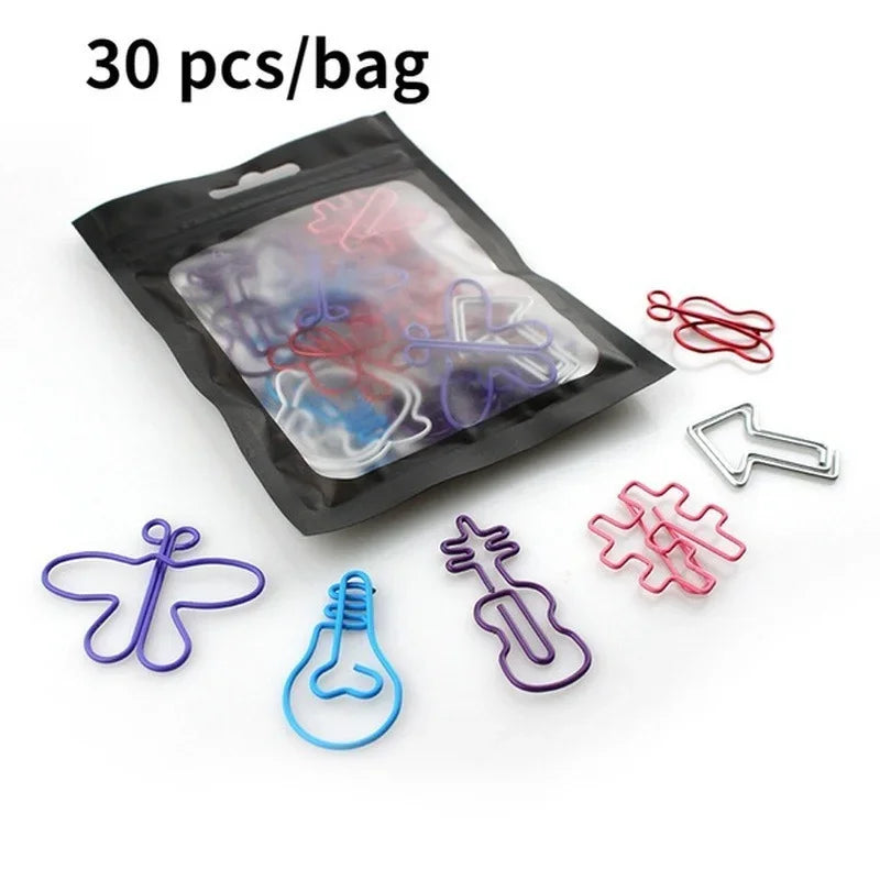 A black bag containing 30 colorful decorative bookmarks made from paper clips.