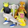 A collection of plush toys featuring various animals including a shark, an elephant, a monkey, and a lemur.
