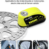 Yellow disc brake lock with alarm for bicycles and motorcycles shown next to a brake rotor.