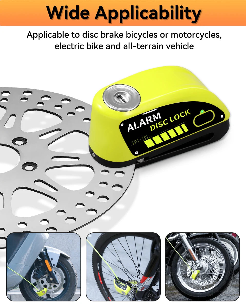Yellow disc brake lock with alarm for bicycles and motorcycles shown next to a brake rotor.