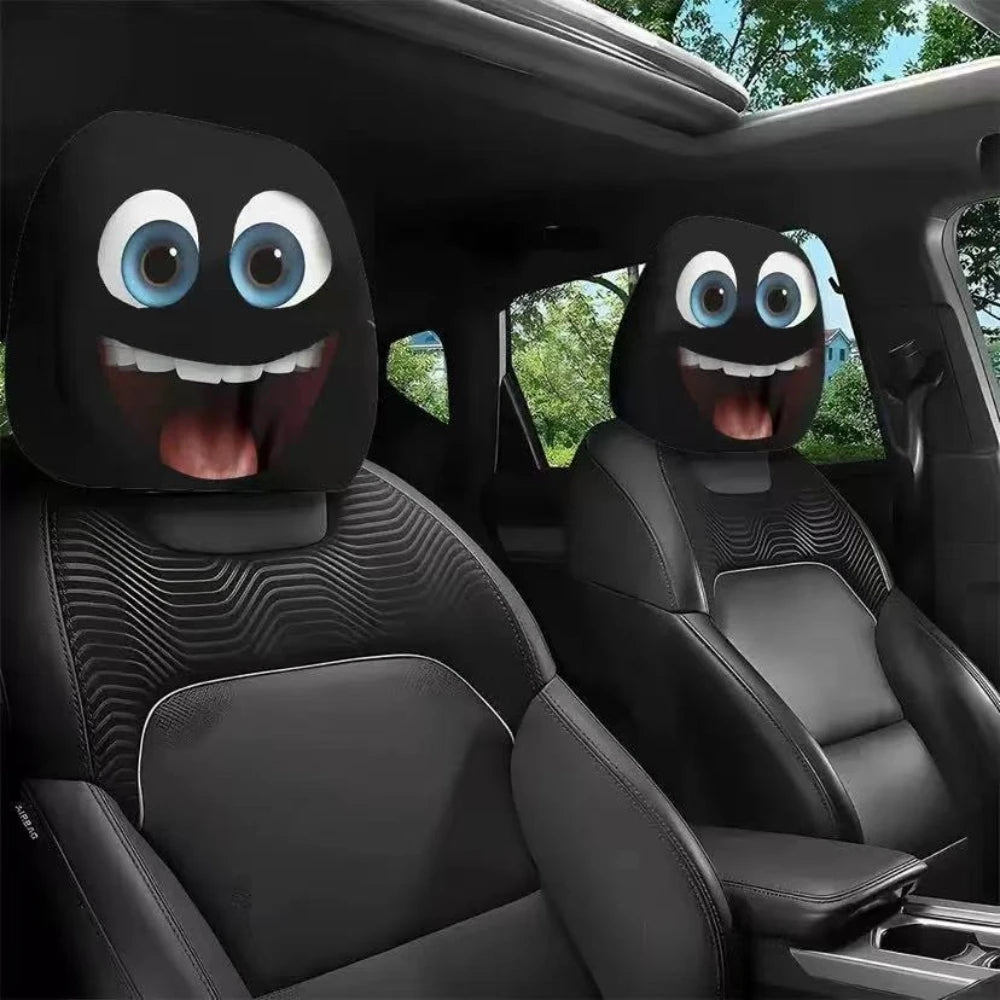 A pair of horror-themed car headrest covers featuring creepy face designs on black leather seats.