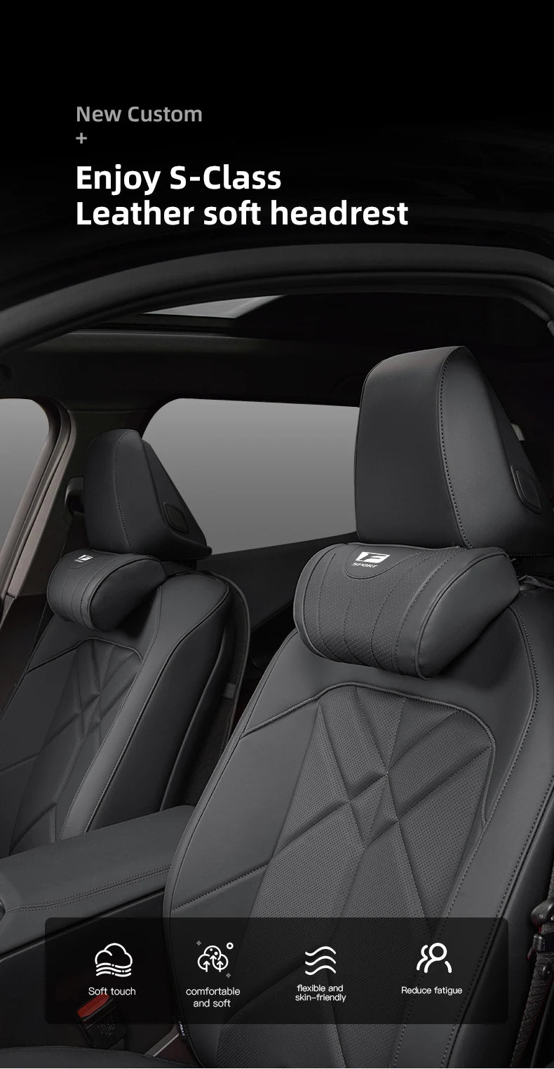 Close-up view of a black leather car seat headrest neck pillow with soft touch and flexible design.