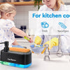 A 3-in-1 kitchen soap dispenser and sponge holder set is shown with a child and an adult in a kitchen setting.