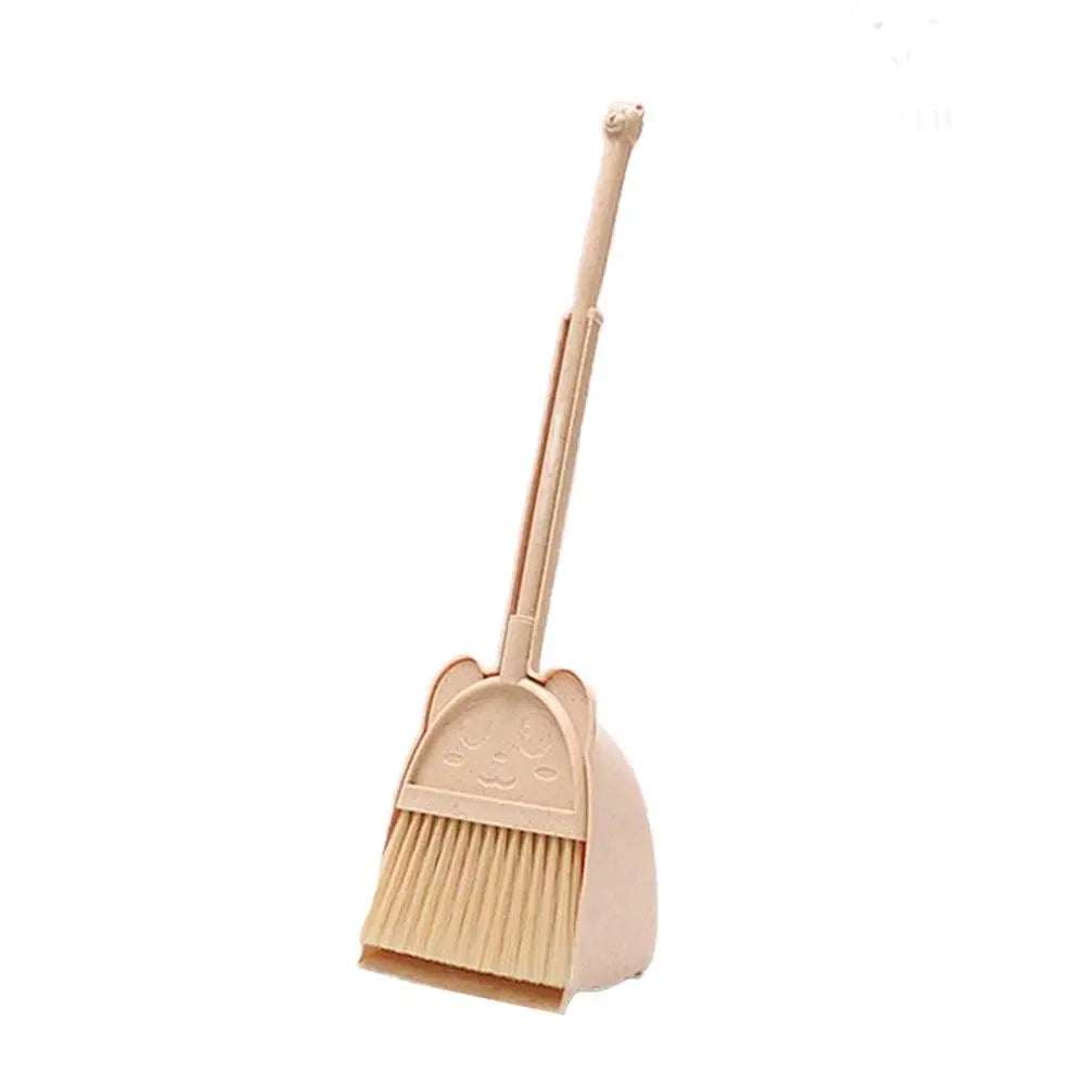 A light beige kids broom and dustpan set with an adjustable mop.