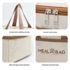 Insulated lunch bag featuring a fabric handle, metal slider closure, mesh pockets, and printed logo on a beige background.
