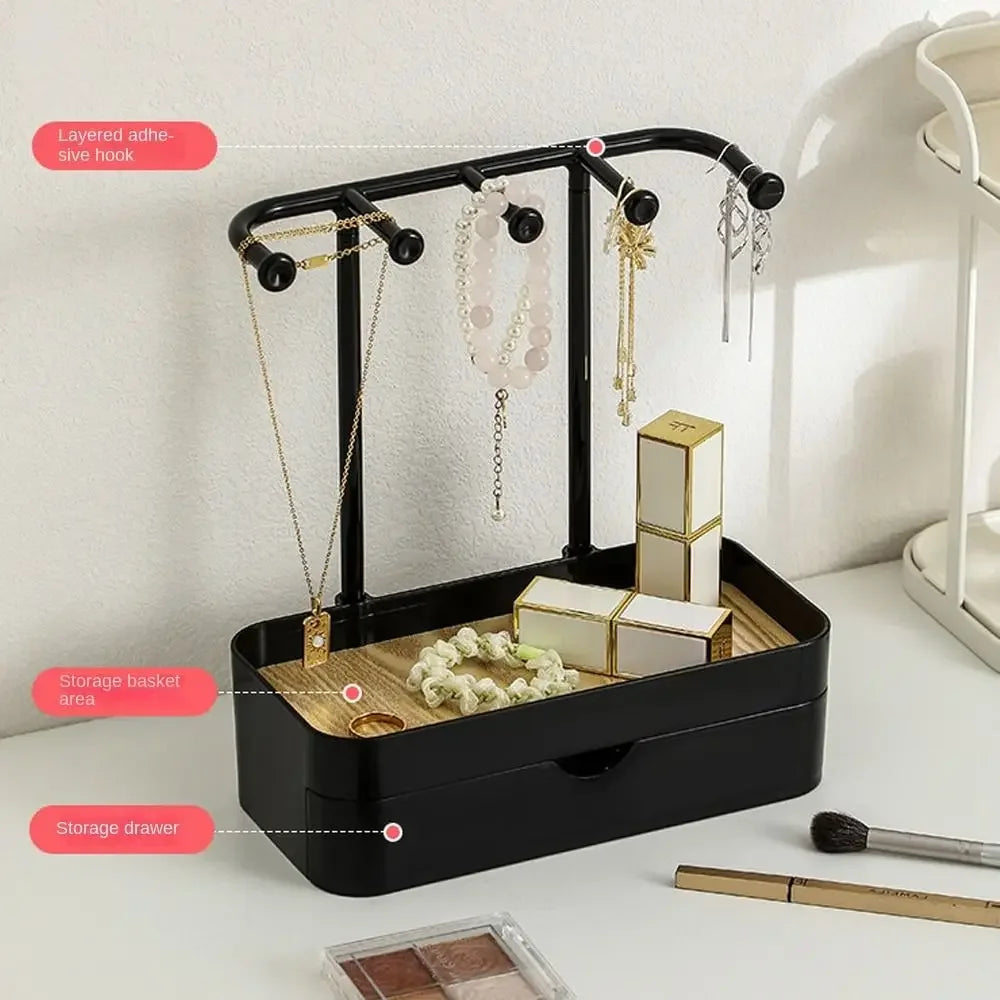 A black elegant jewelry display rack featuring a storage basket, drawer, and hooks for hanging necklaces and earrings.