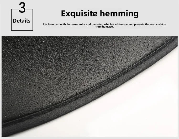 Close-up view of a black car seat cover showing exquisite hemming detail.