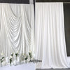 White pleated fabric draping used as a backdrop or decor